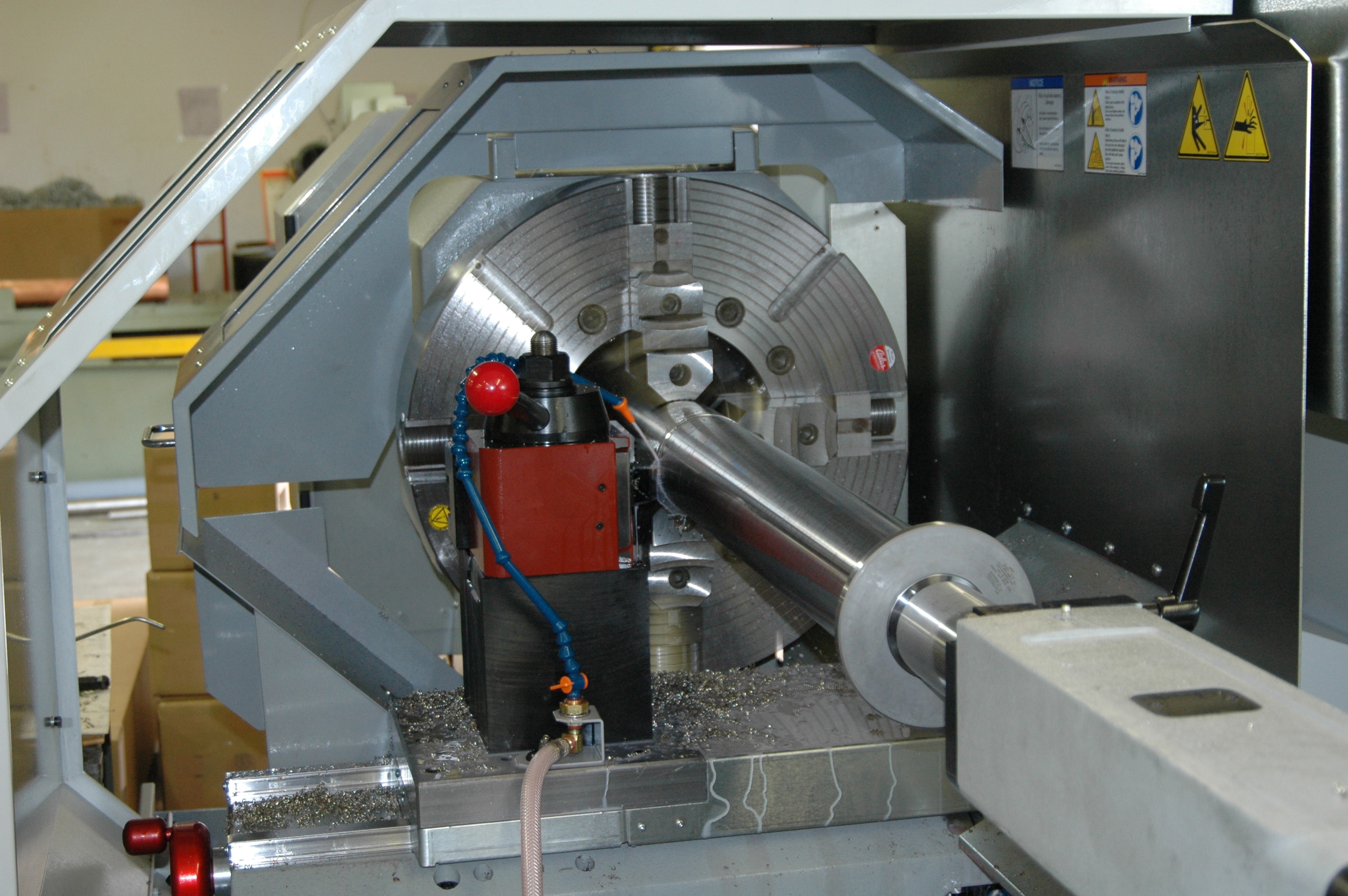 Machining One Meter SS Backing Tube on a Large Bore Lathe